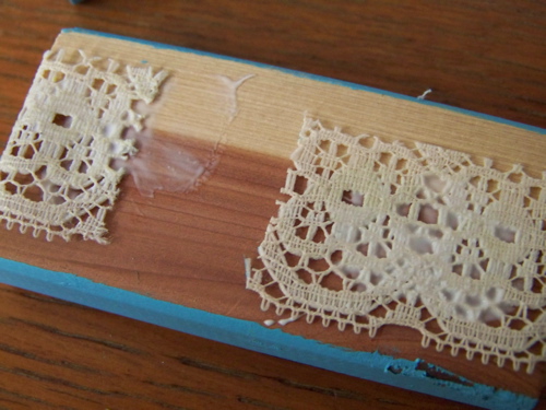 gluing the lace to the wood
