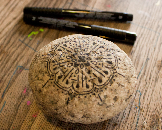 rock decorated with Faber-Castell Pitt pens