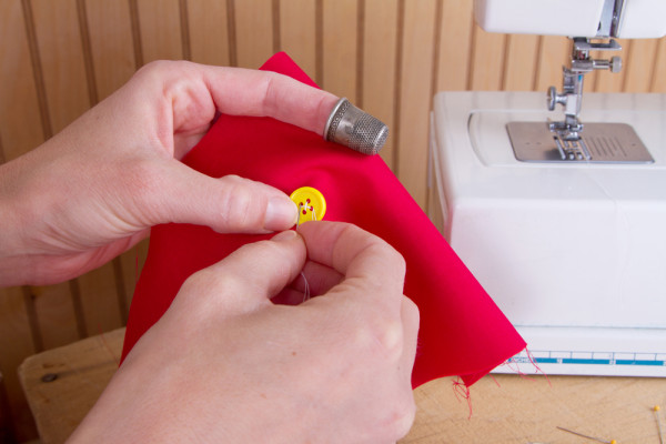 how to sew a button