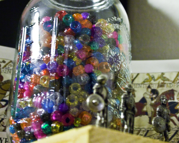 mason jar holds beads
