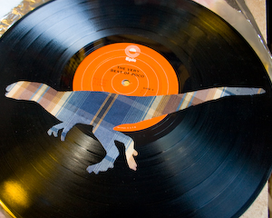 Dinosaur Upholstery Fabric on Vinyl Record Album