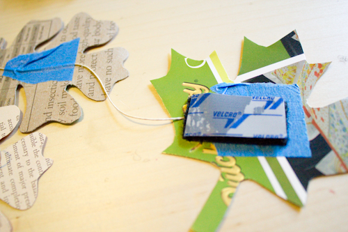 attach adhesive Velcro to the ends of the garland