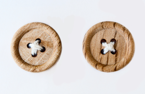 wooden buttons image via Shutterstock