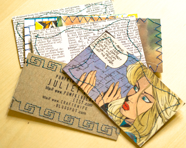 business cards made from recycled paper, embellished with stamps and sewing