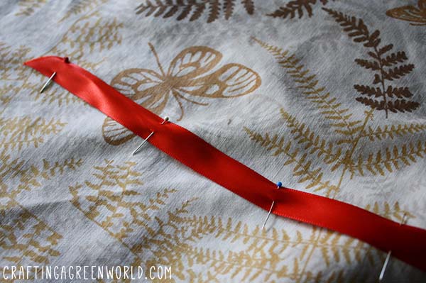 mend a torn tablecloth pinned ribbon