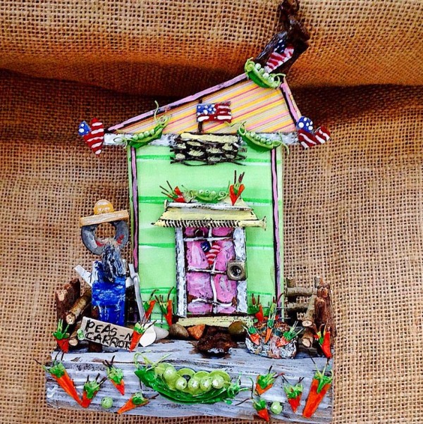 Mixed media artist Deane Bowers makes vibrant, cheerful upcycled folk art pieces from found objects.