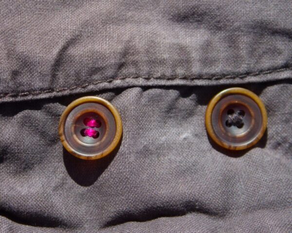 button on pants