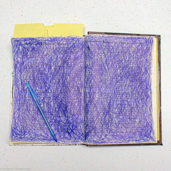Ink Scribbles in an Altered Book