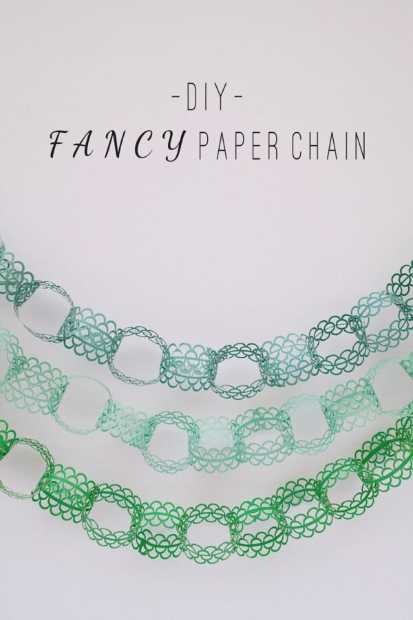 paper punched paper chain image via Tell Love and Party