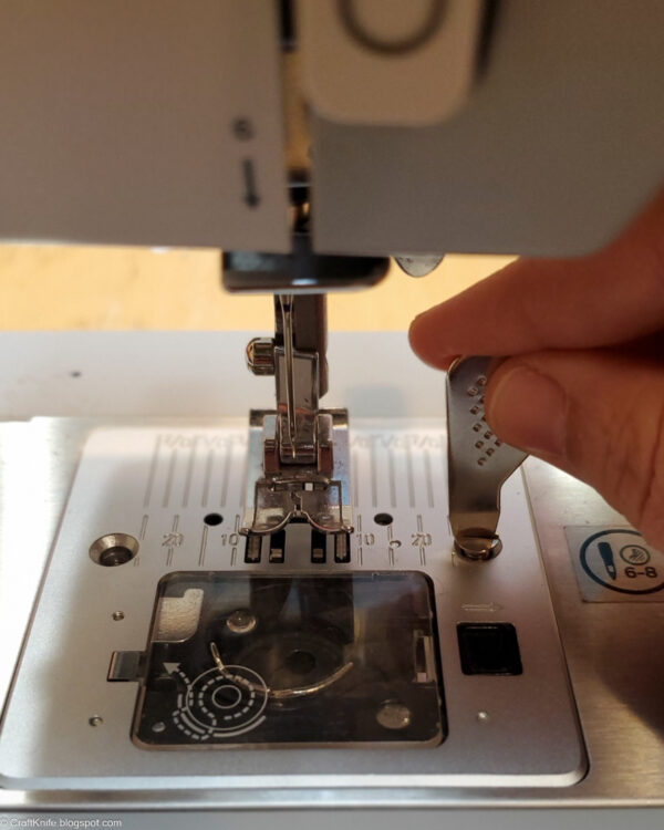 replace the sewing machine needle plate