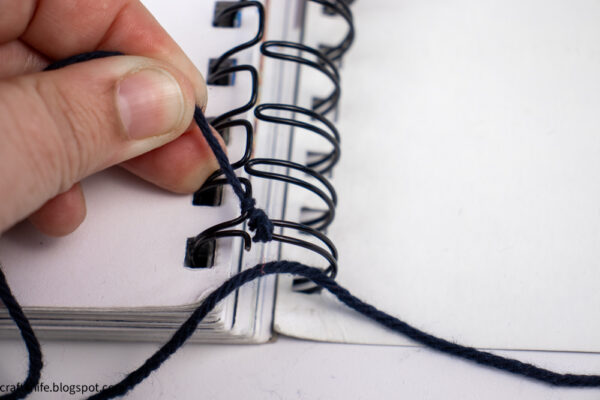 fix a wire-bound notebook
