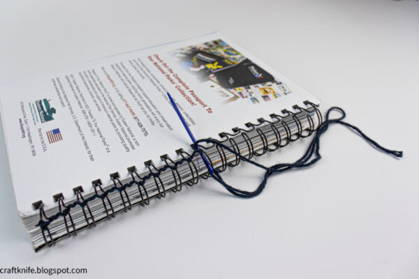 fix a wire-bound notebook