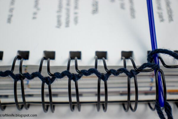 fix a wire-bound notebook