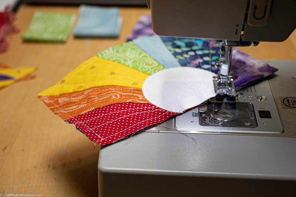 Colorful quilted greeting cards featuring bug motifs, illustrating how printable designs integrate with fabric crafts